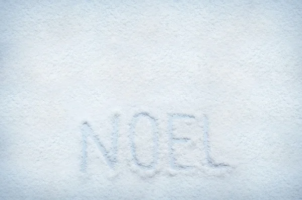 Text noel auf Schnee geschrieben — Stockfoto