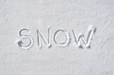 Text SNOW hand written on snow background. Horizontal winter postcard template. Space for copy, lettering.