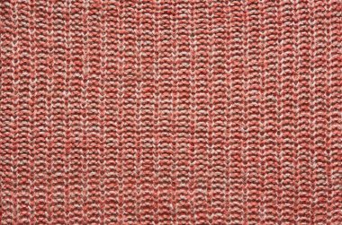 Red orange knitted sweater texture background.  Space for copy, text, lettering.