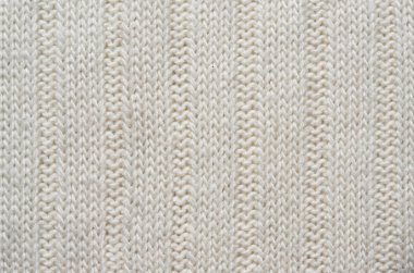 White knitted sweater texture background. Space for copy, text, lettering.