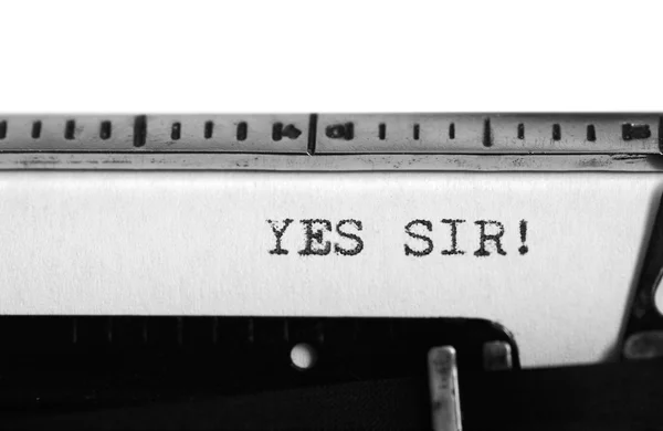 Uma máquina de escrever. Texto de digitação: Sim senhor ! — Fotografia de Stock