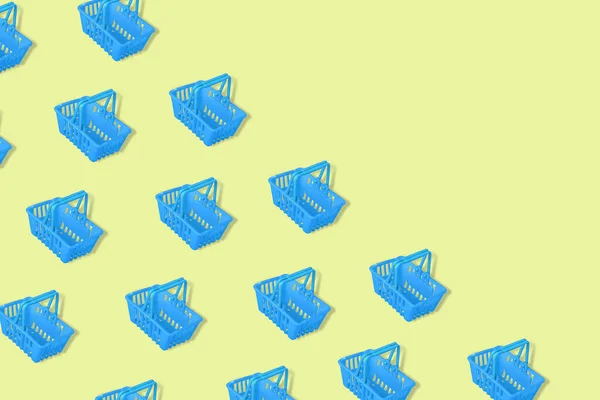 Outstanding Pattern Blue Empty Shopping Baskets Isolated Yellow Background Modern — Stock Photo, Image