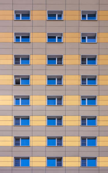 The windows of the facade of a modern building