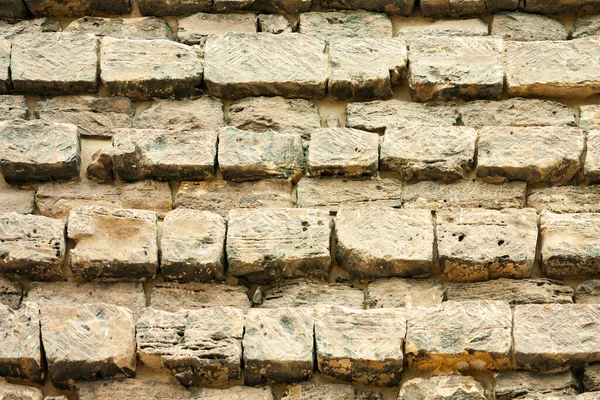Παλιές Οικοδομικές Πέτρες Τοποθετημένες Ζυγές Σειρές Σχηματίζοντας Έναν Τοίχο Κοντινό — Φωτογραφία Αρχείου
