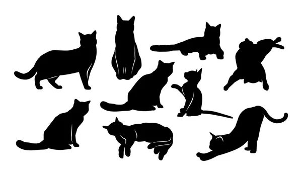 Beyaz arka planda siyah kedi siluetleri — Stok Vektör