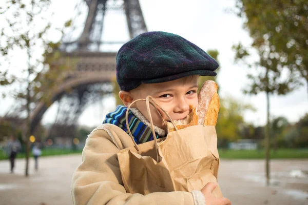 Adorable Small Boy Eating Ffrench Bread Eiffel Tower — Stock Photo, Image