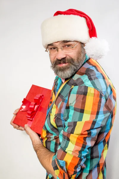 Weihnachtsmann mit Geschenken — Stockfoto