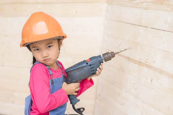 Kid Engineer Carpenter Work Portrait Holding Drill Wood Background — Stock Photo, Image