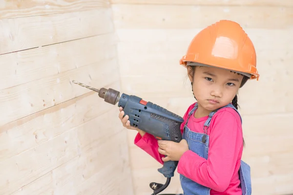 Kid Engineer Carpenter Work Portrait Holding Drill Wood Background — Stock Photo, Image