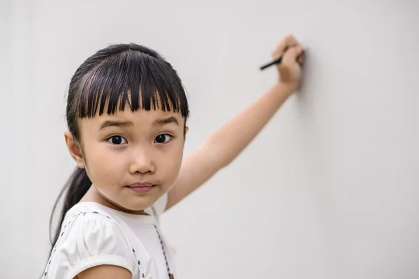 Kid Surprise Mood While Writing Wall — Stock Photo, Image