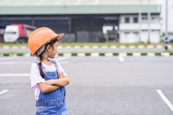 Little Girl Orange Helmet Warehouse Center Background Transportion Work — Stock Photo, Image
