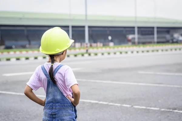 Little Girl Green Helmet Warehouse Center Background Transportion Work — Stock Photo, Image