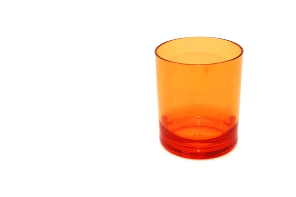 Orange plastic glass — Stock Photo, Image