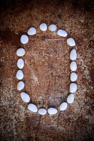 'o' Alphabet aus weißem Stein — Stockfoto