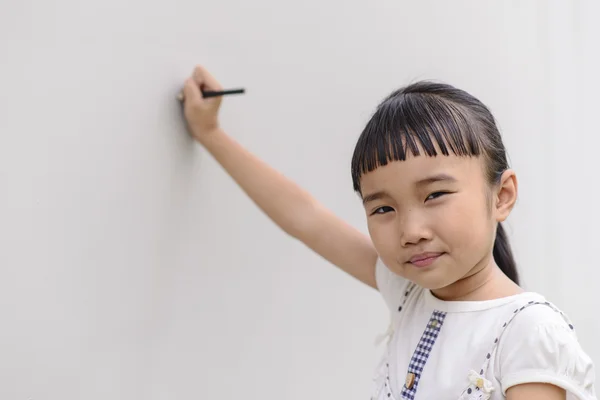 Kid write on wall — Stock Photo, Image