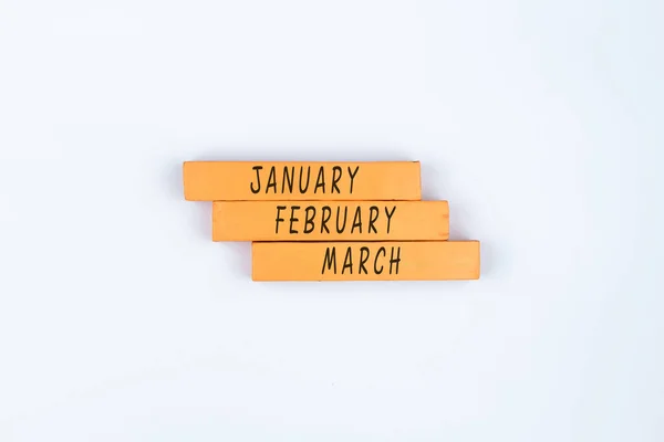 带有白色背景特写的1月 2月和3月的木制立方体 — 图库照片