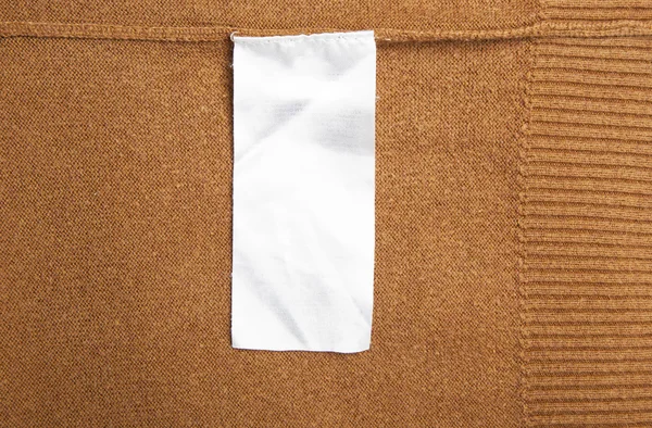 Clothes with label tag — Stock Photo, Image