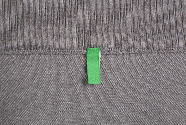 Clothes with label tag — Stock Photo, Image