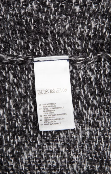 Washing label on cloth — Stock Photo, Image