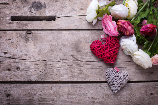 Pink flowers and white decorative heart