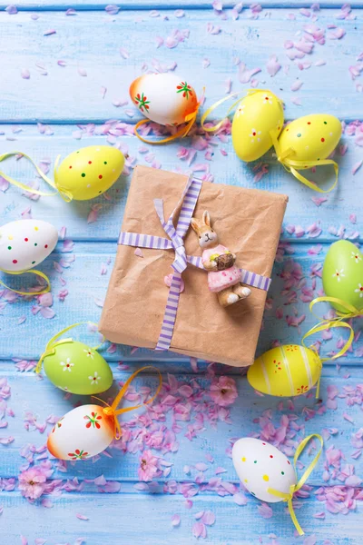 Box with present and Easter eggs — Stock Photo, Image