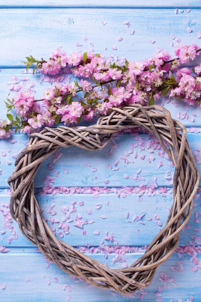 Big decorative heart and sakura flowers — Stock Photo, Image