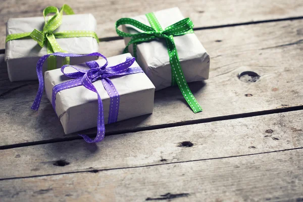 Festive gift boxes with presents — Stock Photo, Image