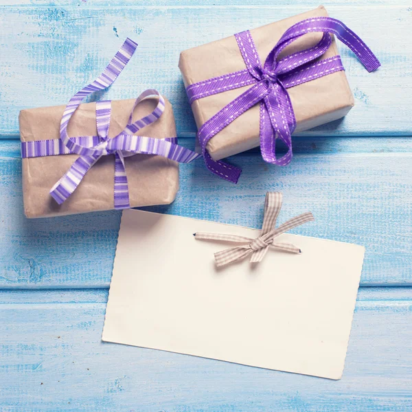 Empty tag and gift boxes — Stock Photo, Image