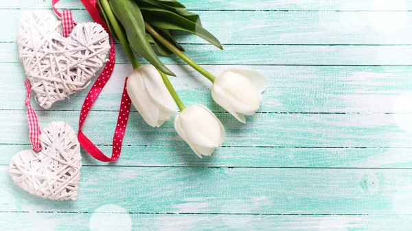 White tulips and decorative hearts — Φωτογραφία Αρχείου