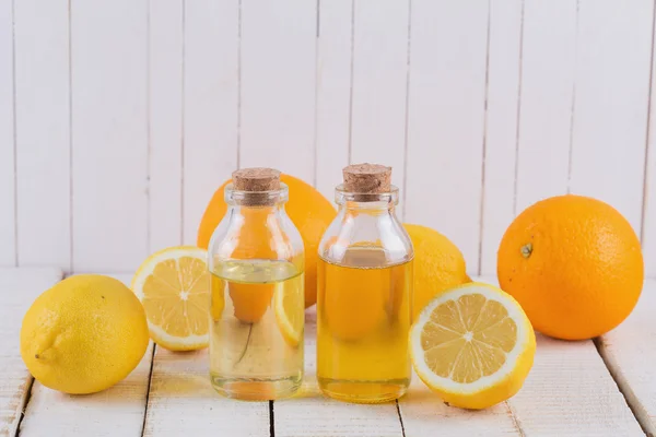 Essential aroma oil with citrus — Stock Photo, Image