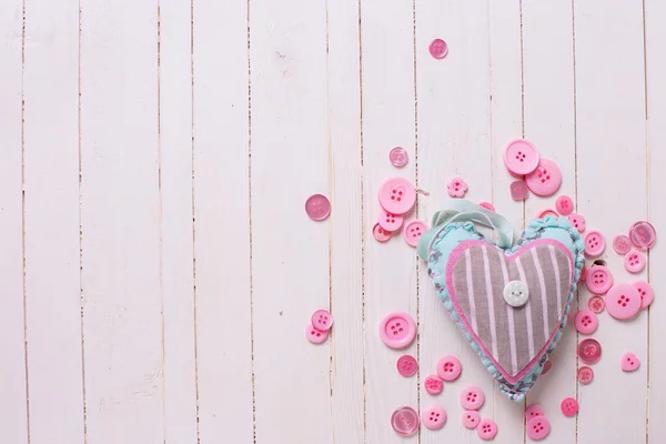 Textile heart and pink buttons — Stock Photo, Image