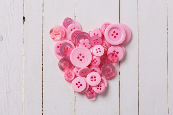 Heart from pink buttoms — Stock Photo, Image