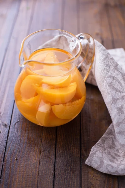 Stewed summer fruits in pitcher — Stock Photo, Image