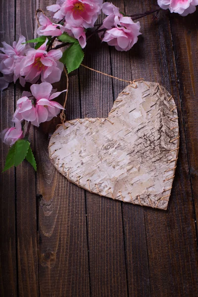 Coração no fundo de madeira. — Fotografia de Stock