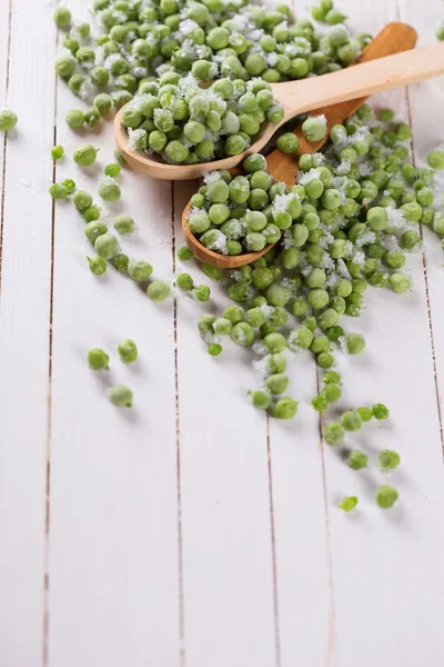 Замороженный зеленый горошек — стоковое фото