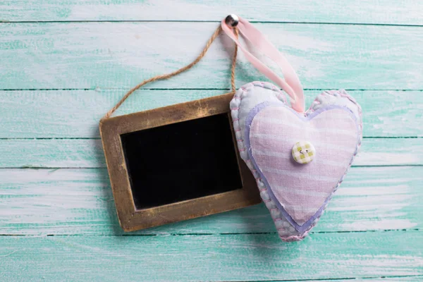 Decorative heart and empty blackboard — Stock Photo, Image