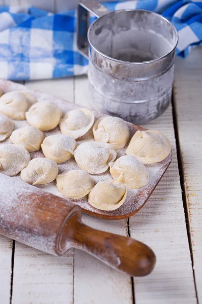 Dumplings with meat on board — Stock Photo, Image