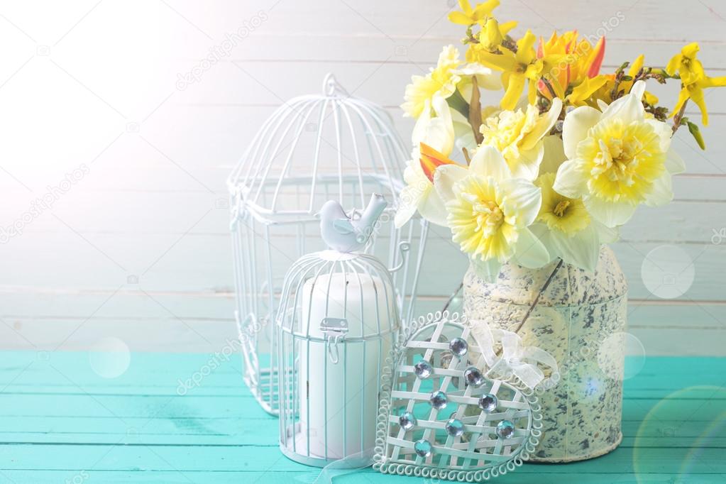 Background with fresh daffodils  and decorative heart