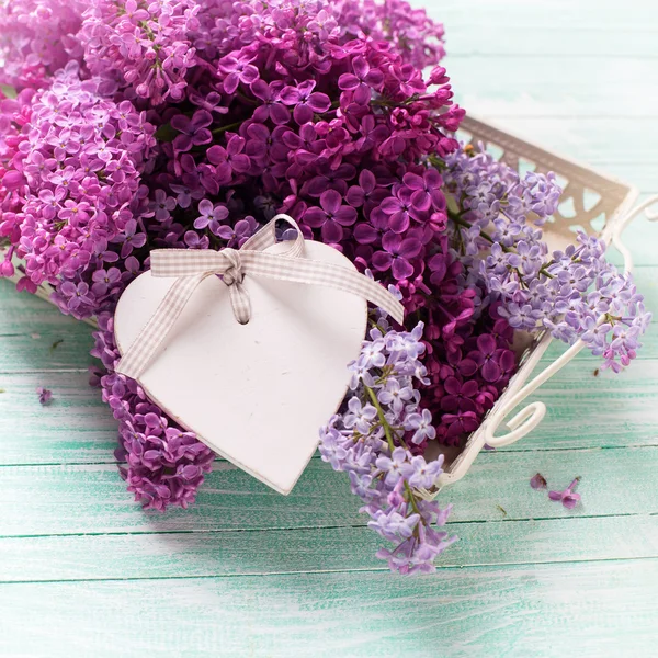 Postcard with lilac flowers and decorative heart — Stock Photo, Image