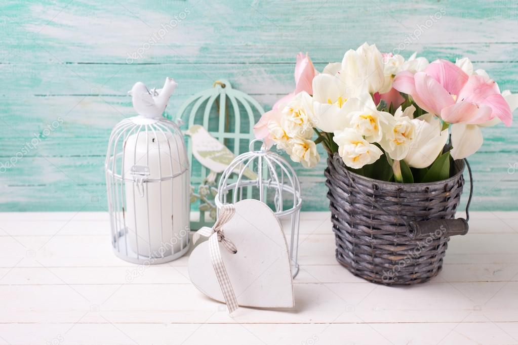 Background with fresh  tulip flowers and heart
