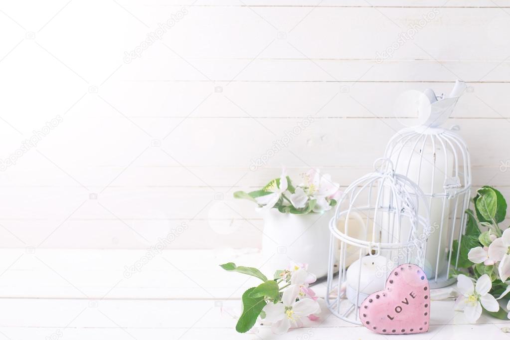 Candles, decorative heart and blossoms