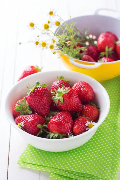 Fresh strawberries in bowls — Stock Photo, Image