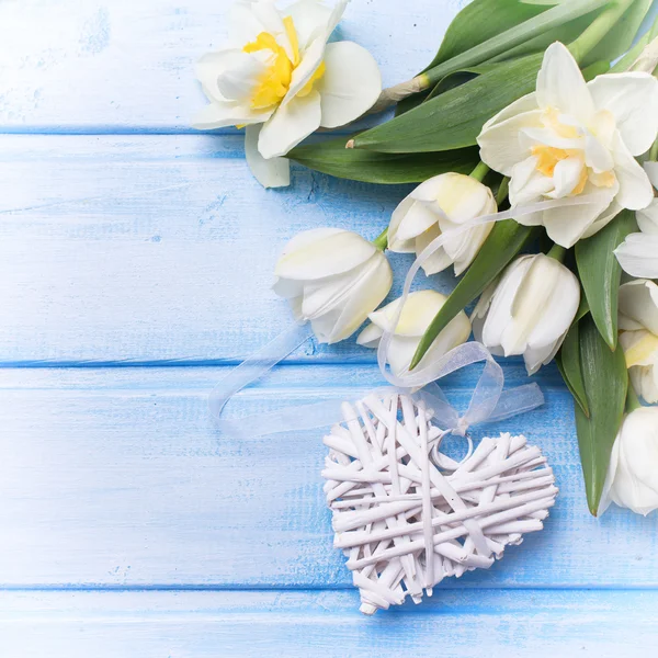 Fresh flowers and decorative heart — Stock Photo, Image