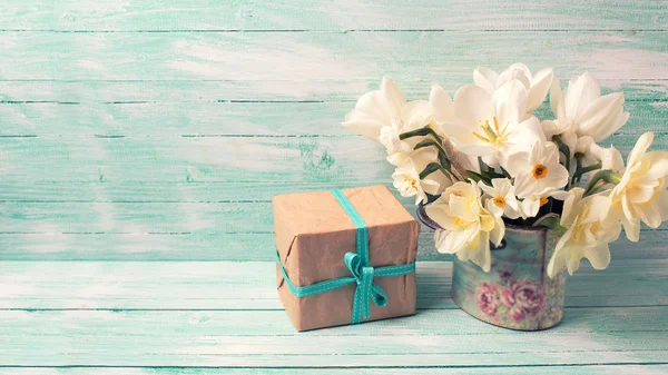 Flowers and box with present — Stock Photo, Image