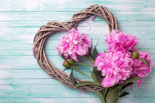 Peonies and  decorative heart — Stock Photo, Image
