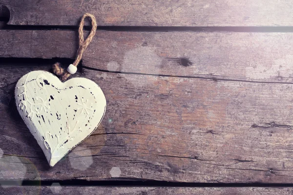 Decorative heart on wooden  background. — Stock Photo, Image