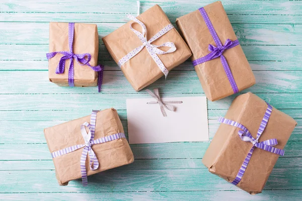 Wrapped boxes and empty tag — Stock Photo, Image