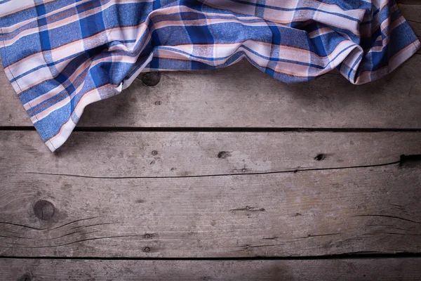 Kitchen towel  on wooden background. — Stock Photo, Image