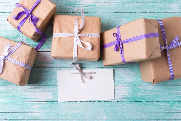 Wrapped boxes  and empty tag — Stock Photo, Image