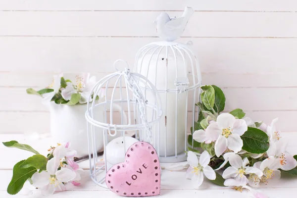 Candles in decorative bird cages — Stock Photo, Image